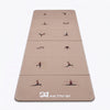 A beige yoga mat with printed exercise pose illustrations and the brand name 'AKTIV 91' at the bottom, shown on a clean white background.