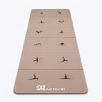 A beige yoga mat with printed exercise pose illustrations and the brand name 'AKTIV 91' at the bottom, shown on a clean white background.